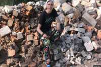 Сибирячка помогает отстраивать дома украинцев