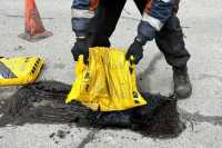 Ямковiсть на мiських автошляхах Днiпра усувають за європейською технологiєю