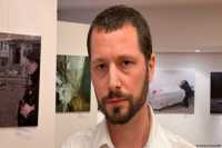 Один из последних покинувших Мариуполь журналистов открыл выставку