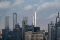 В самой высокой разделенной башне в мире 65 этажей