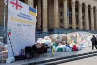 Как белорусы и россияне, бежавшие в Грузию, помогают Украине