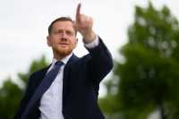 Премьер-министр Саксонии призывает "заморозить" войну в Украине